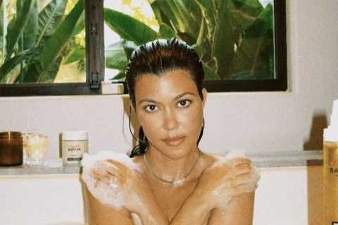 Kourtney Kardashian goes totally naked in the bath in sexy new ad for husband Travis Barker’s..