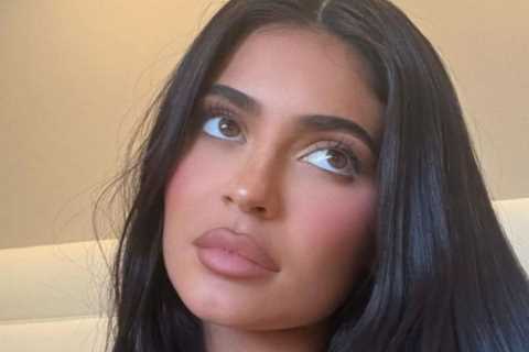 Kylie Jenner busts out of extremely low-cut black top for sexy new photos after sudden split from..