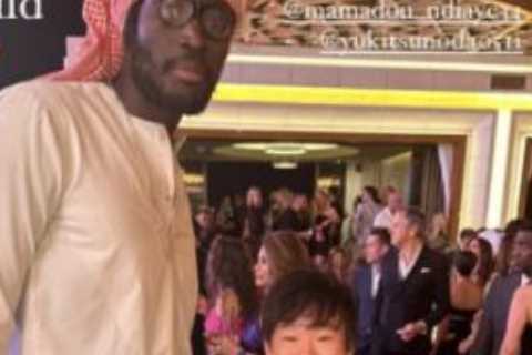 F1 fans in hysterics after 5ft 3inch driver Yuki Tsunoda poses alongside basketball star… who is..