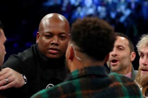 Jake Paul and topless Tommy Fury pulled apart in fiery exchange as bitter boxing rivals come face..