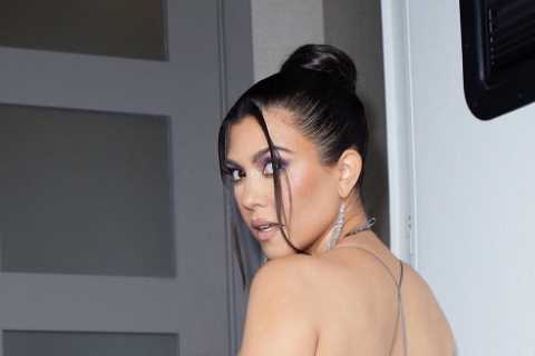 Kourtney Kardashian proudly shows off real hair without extensions including tiny bun and short..