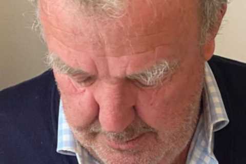 Jeremy Clarkson poses with new grandchild Arlo after daughter Emily gives birth