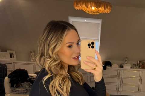 Pregnant Kate Ferdinand makes her baby bump ‘disappear’ as she poses in huge dressing room at home