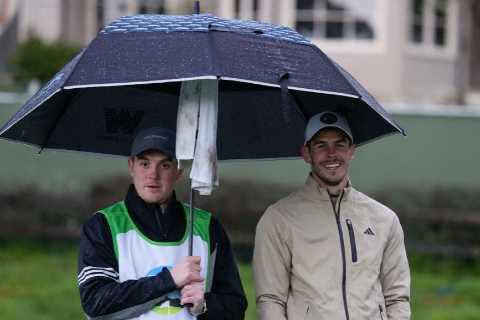Gareth Bale braves the elements to finish on 16-under-par on PGA tournament debut just weeks after..