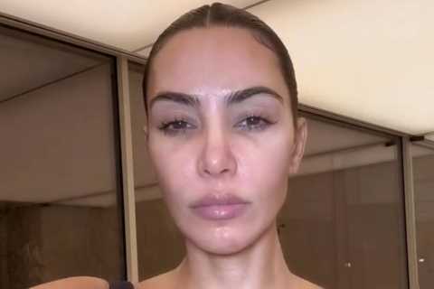 Kim Kardashian flaunts her tiny waist as she ditches her top in new video taken inside huge..