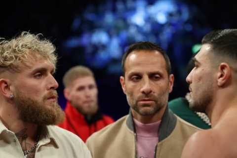 Jake Paul faces off with poster of Tommy Fury after vowing to KO bitter rival in four rounds after..