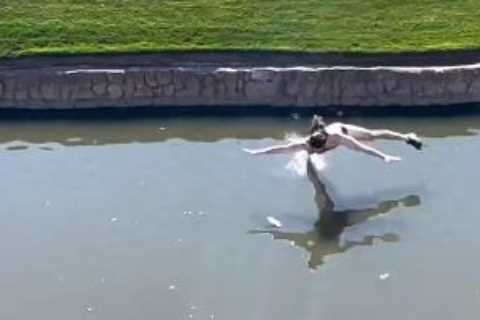 Watch streaker imitate stripper in just underwear on golf course at PGA Tour before belly flopping..