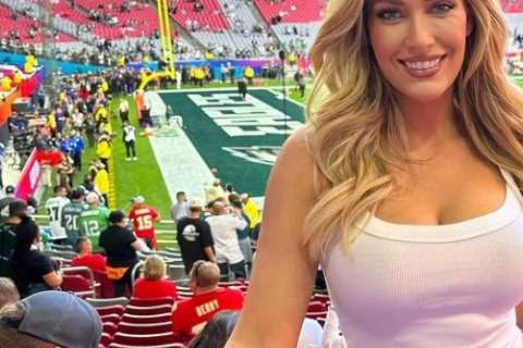 Paige Spiranac branded ‘perfection’ in tight-fitting white top and jeans as she watches Super Bowl..