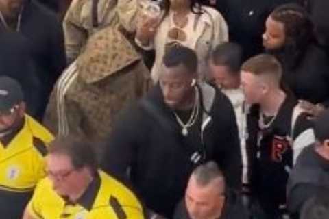 Floyd Mayweather heads out shopping with huge entourage and ’30 security guards’ as boxing legend..