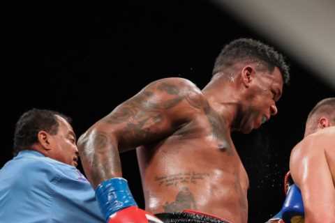 Watch as fearsome heavyweight is stunned by brutal shot to ribs before he takes savage beating to..