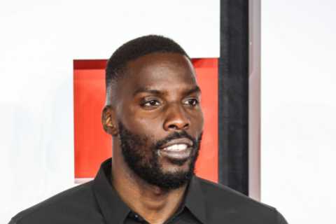 Lawrence Okolie scraps with Richard Riakporhe at Creed III premiere with boxers held back by pals..