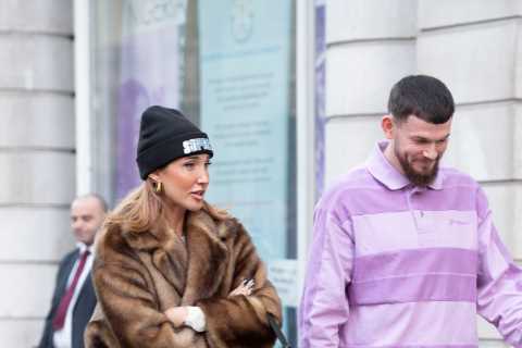 Megan McKenna spotted with international footballer leaving five star London hotel after..