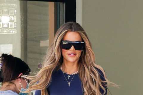 Khloe Kardashian flaunts skinny legs, tiny waist and famous butt as she’s seen clutching NSFW item..