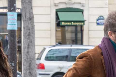 David and Victoria Beckham dress in colourful clothes as they leave hotel with Brooklyn &amp;..