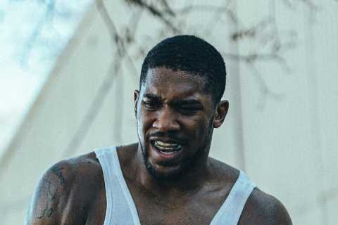 Anthony Joshua implements Rocky-style training method as Brit chops down trees in gruelling Texas..