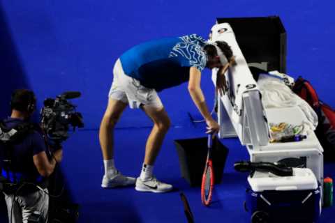 Shocking moment Taylor Fritz VOMITS on court mid-match after visibly struggling against Tommy Paul