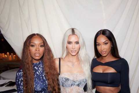 Kim Kardashian shows off her curves in see-through lace dress for sexy pic after fans claim she got ..