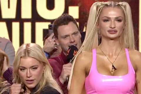 OnlyFans star Elle Brooke faces off against giant opponent ahead of next fight leaving fans in..
