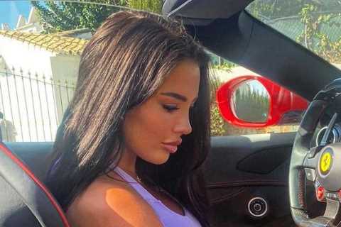 Yazmin Oukhellou poses in £175k Ferarri after quitting the UK for Dubai