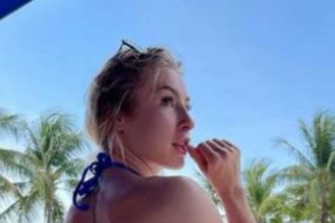 Boxer and OnlyFans star Astrid Wett gets ‘buns out’ and shows off tan lines in sexy blue bikini..
