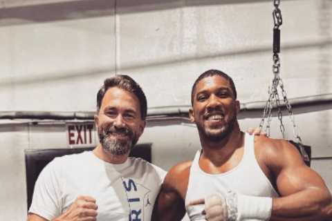 Hulking Anthony Joshua poses with Eddie Hearn as promoter stops off in Texas to watch heavyweight..