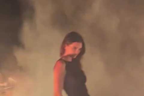 Kendall Jenner goes braless as she flaunts tiny waist in black dress for unedited video after..