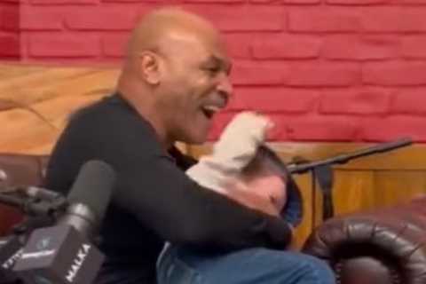 Watch Mike Tyson fight Hasbulla, pick him up, cradle him like a baby and bite his ear in ‘crazy’..