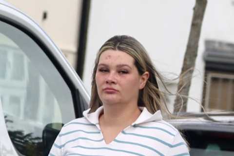 Pregnant Shaughna Phillips goes make-up free as she runs errands in £46k Range Rover and counts..