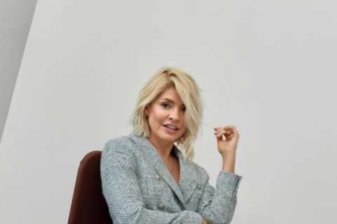 Holly Willoughby flashes her legs as she poses in a micro mini for Marks and Spencer