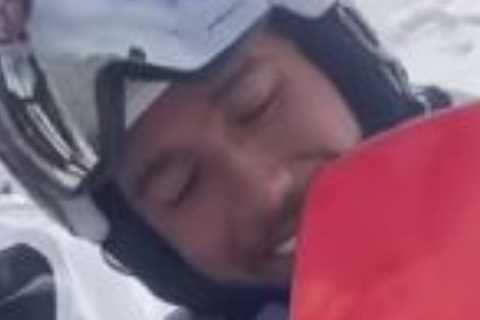 Watch ‘legend’ Lewis Hamilton get soaked as he snowboards into freezing Antarctic water.. then hike ..