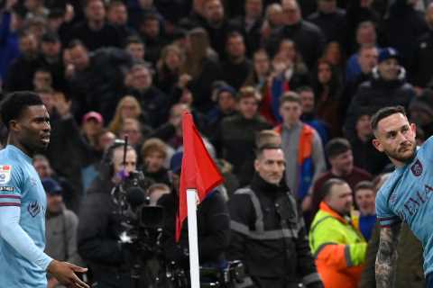 Burnley star Johann Gudmundsson hit on head with object thrown from crowd as he celebrates goal..
