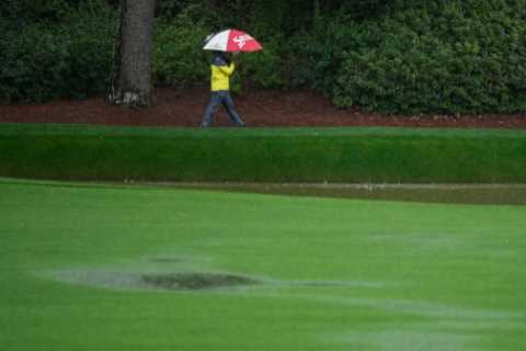 Masters ABANDONED due to torrential rain as fans fume after watching just one hole of leaders on..