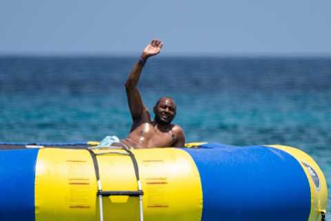 Arsenal legend Patrick Vieira shows off belly tattoo as he relaxes in Barbados amid talk of return..