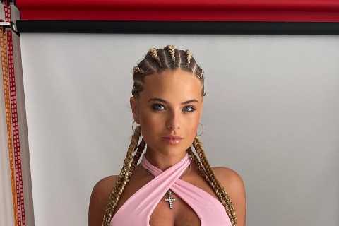 Busty ring girl Apollonia Llewellyn shows off major underboob as fans say outfit ‘doesn’t leave..