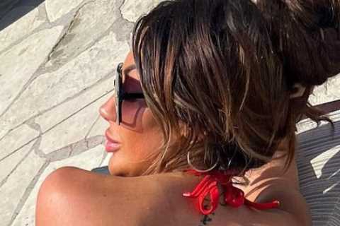 Chloe Ferry flashes her bum in barely-there thong bikini as she soaks up the sun on holiday