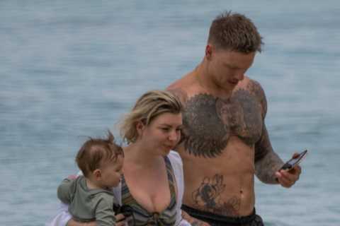 Olivia Bowen looks amazing in new plunging bikini as she hits the beach again on holiday with hubby ..