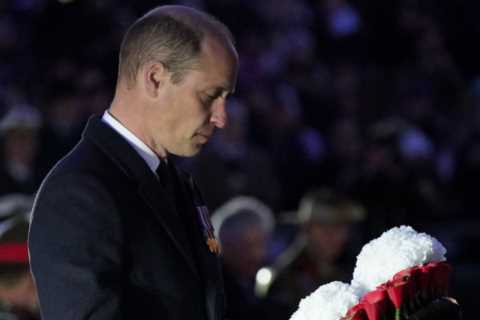 Prince William pays his respects to fallen Australian and New Zealand troops at Anzac Day dawn..