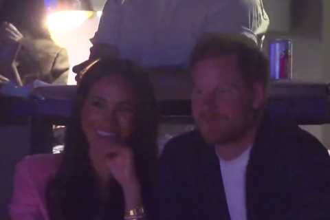Meghan Markle and Prince Harry giggle and pull faces at Lakers basketball game after coronation snub