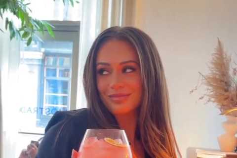 Love Island’s Olivia Hawkins goes braless in plunging black top in glam snap