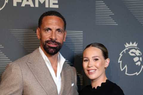 Rio Ferdinand kisses wife Kate as he cups her blossoming baby bump at his Premier League Hall of..