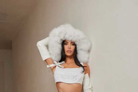 Kim Kardashian flaunts her ultra tiny waist in white crop top and denim skirt for new photos after..