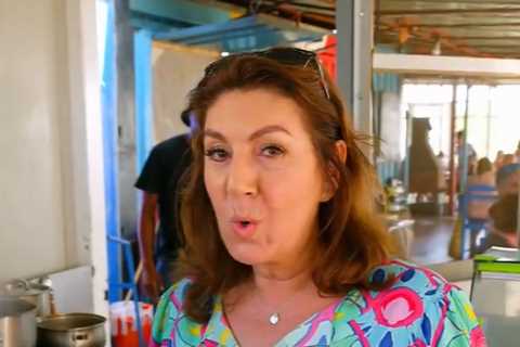 Jane McDonald sends fans wild as she spontaneously bursts into song while riding a bike in Cape..