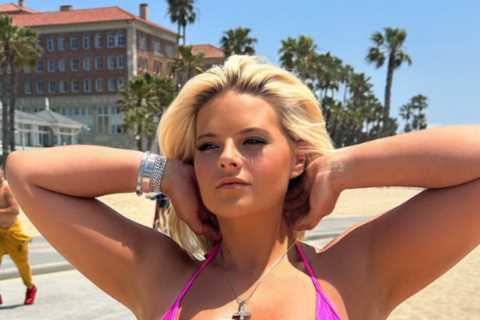 Busty boxing ring girl Apollonia Llewellyn shows off major underboob as she almost spills out of..