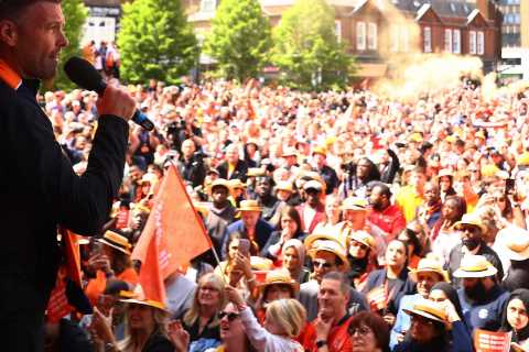 Luton Town fans celebrate team’s Premier League promotion with open top bus parade