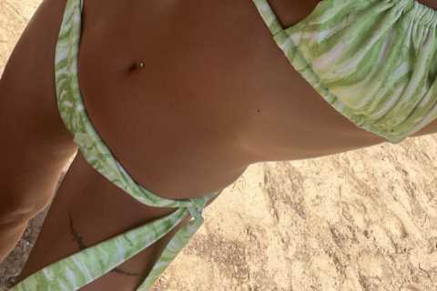Love Island star Samie shows off toned bikini body in Spain after sparking rumours she’s back with..