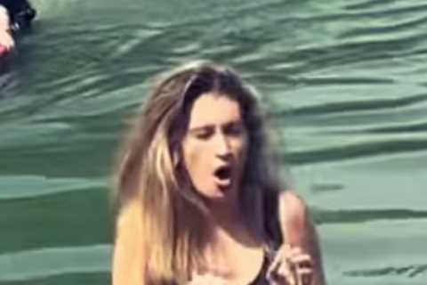 Ex-Emmerdale star Charley Webb shows off her figure as she strips down to swimsuit as she takes a..