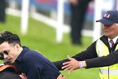 Protestor sprinting on Epsom Derby racecourse tackled as animal activists’ plot to disrupt race is..