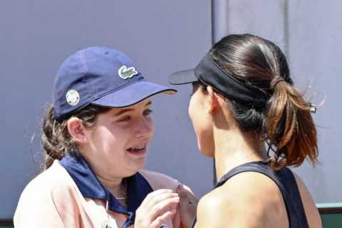 Tennis star breaks down in tears and walks out of French Open press conference as she struggles in..