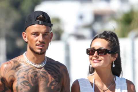Arsenal ace Ben White and wife Milly Adams walk hand in hand as they enjoy romantic honeymoon in..