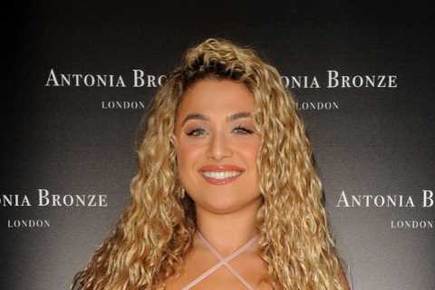 Love Island’s Antigoni wears nothing but a barely-there bikini and tiny mini skirt as she parties..